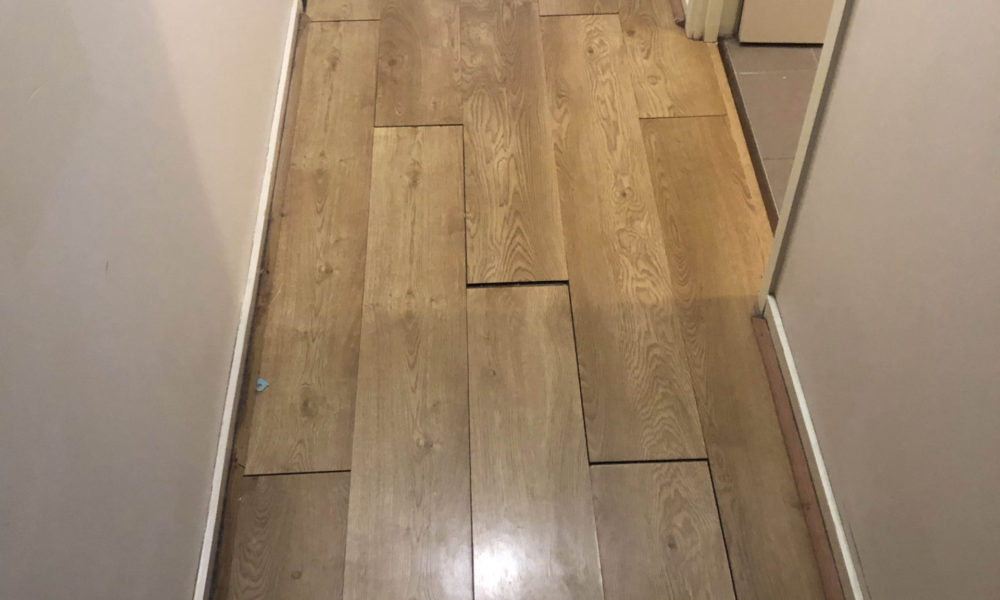 water damaged floor boards